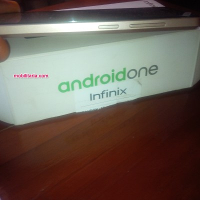 side view photo of infinix hot 2 android phone